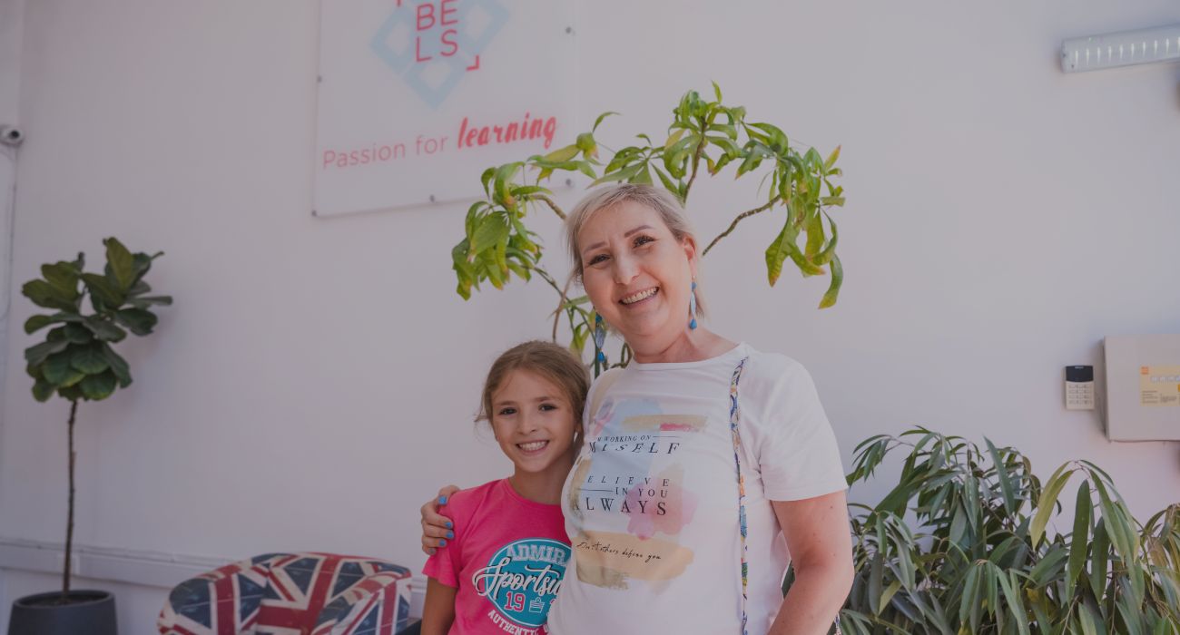 a parent and child attending our English courses for families in Malta.